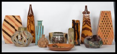 A good collection of studio pottery by potter Cynthia Scattergood, several pieces to include