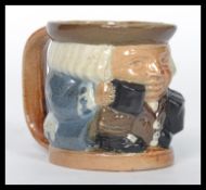 A 19th century Victorian Royal Doulton Lambeth Stoneware Toby jug by Harry Simeon, impressed marks