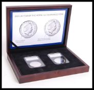 A Royal Mint 2014 UK Year of the Horse 1oz Silver Mule Coin twin pack. In 2014 The Royal Mint made