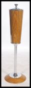 A retro mid century chrome and faux wood pedestal free standing ashtray. Chrome pillar with faux