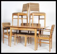 A good mid 20th century Gordon Russell solid walnut draw leaf square refectory dining table together