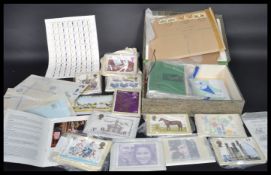 A collection of first day covers / issues and postal stamps to include full sheets dating from the