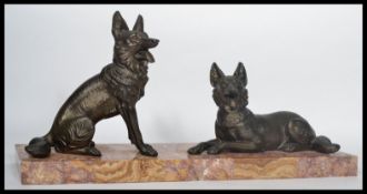 A Vintage early 20th century 1930's Art Deco spelter diorama figurine of dogs raised on a large