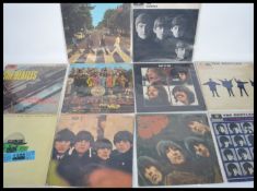 Vinyl Records A collection of ten vinyl long play / LP vinyl records pertaining to The Beatles to