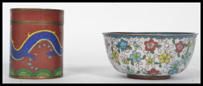 Two Oriental Chinese cloisonne items to include a lidded pot of cylindrical from having a dragon
