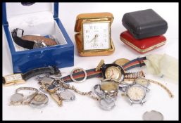 A collection of vintage 20th century watches to include a Rotary boxed watch , nurses watch , travel