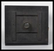 A believed 19th century metamorphic folding plate pinhole camera with extras such as a spare brass