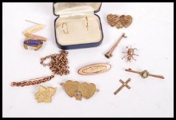 A collection of yellow metal jewellery to include a boxes pair of 9ct gold earrings a 9ct gold