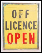 A large 20th century retro metal advertising sign ' Off License ' The large metal sign with surround