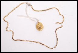 A 9ct gold box link necklace chain (af) having a replacement clasp. Weighs 9 grams. Along with a