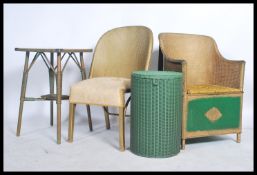 A collection of vintage 20th century Lloyd Loom Lusty furniture to include bedroom chairs, linen