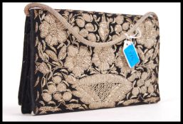 A vintage mid 20th century rare Aircraft cigarette lighter clock combo together with a ladies