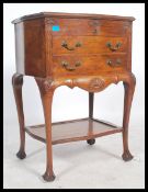 A 1920's solid oak Queen Anne revival canteen table cabinet. The cutlery canteen by Joseph Rodgers &