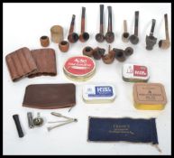 A good collection of tobaccco smoking pipes in burr walnut to include names, Dunhill , Big Ben and