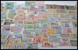 A collection of bank notes from around the world to include China 1 Fen notes x 4, British Armed