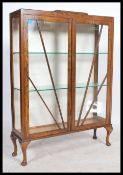 A vintage 20th century 1930's  Art Deco china display cabinet raised on cabriole legs with