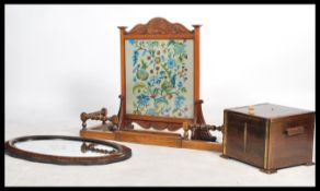 A vintage early 20th century extendable oak barley twist fire fender together with an oak fire