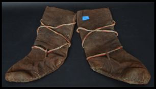 A pair of believed 19th century Inuit style / Canadian ' Mukluk ' leather hide boots / shoes. Simple