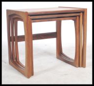 A G-Plan retro teak wood 1970's graduating nest of tables in the Quadrille pattern. The tables