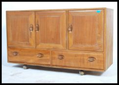 Ercol - Windsor - A 1960's retro vintage beech and elm sideboard comprising of a set of three