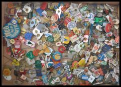 A collection of vintage 1960's / 1970's European advertising pin badges for companies to include; du