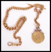 A 19th century Victorian 1887 sovereign mounted on scrolled mount with a hallmarked 9ct gold