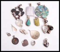 A dealer lot of silver to include necklace of various shapes and sizes, all silver mounted. To