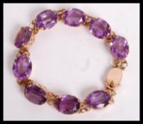 A superb vintage 14ct gold and synthetic alexandri