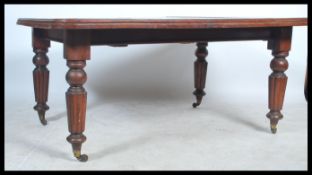 A large mid 19th century Victorian wind out dining