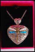 A silver and enamel heart locket pendant having a
