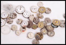 A large collection of vintage wristwatch movements
