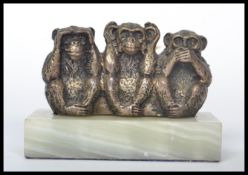A vintage wise monkey 'see no evil, hear no evil,