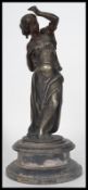 A 19th century spelter figurine statue of a maiden