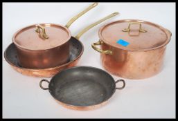 Two vintage 20th century copper sauce pans, both w