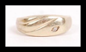 A hallmarked 9ct gold and diamond signet ring set