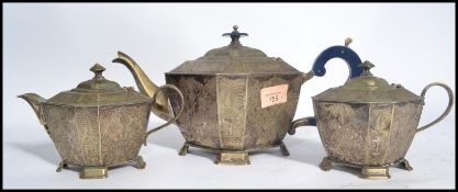 A 19th century Chinese silver plate three piece tea service consisting of tea pot , sugar pot and
