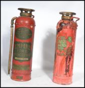 A good early 20th century Empire vintage fire extinguisher with brass fittings retaining the
