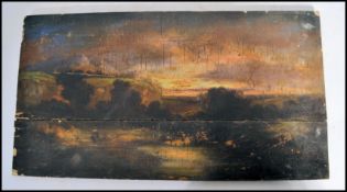 A 19th century oil on board of a landscape painting on oak panel with a solitary figure to the