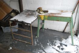 A vintage retro 20th century industrial work bench having a vice to top along with another work
