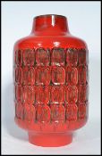 A vintage 20th century West German fat lava vase in a flambe colourway. The vase of bulbous