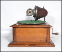 A vintage early 20th century rare table top Gramophone by Nirona. The tin soundbox and horn system