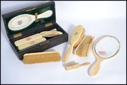 A collection of late 19th / early 20th century Ivory and Ivorine ladies hand held dressing table