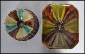A pair of 19th century majolica drip glazed spittoons, one of rectangular form with pierced