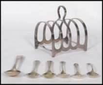 A group of silver hallmarked items to include a near pair of 19th century Victorian  mustard /