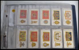 Cigarette cards; Three albums of vintage cigarette cards, all appearing to be full / complete