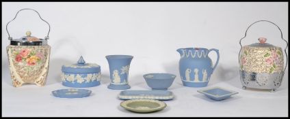 A good collection of Wedgwood jasper ware ceramics together with two Art Deco lidded biscuit barrels