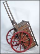 A large early 20th century rustin country wooden horse cart - carriage with large spoked wheels in
