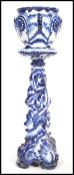 A 19th century Staffordshire ceramic blue and white foliate  jardiniere / pot stand, with blue and