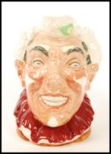 A Royal Doulton character jug 