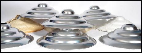 A set of eight vintage 20th century retro ' Space Age ' chrome ceiling pendant UFO type light shades